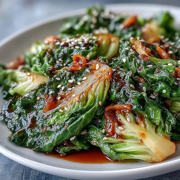 A close-up shows fresh, uncooked ingredients prepped for a quick Hot and Sour Cabbage.